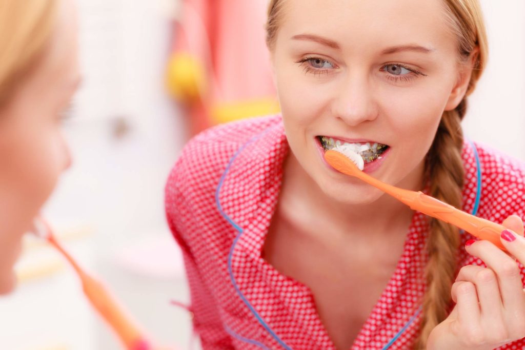 How To Brush Your Teeth While Wearing Braces Orthodontist Toronto